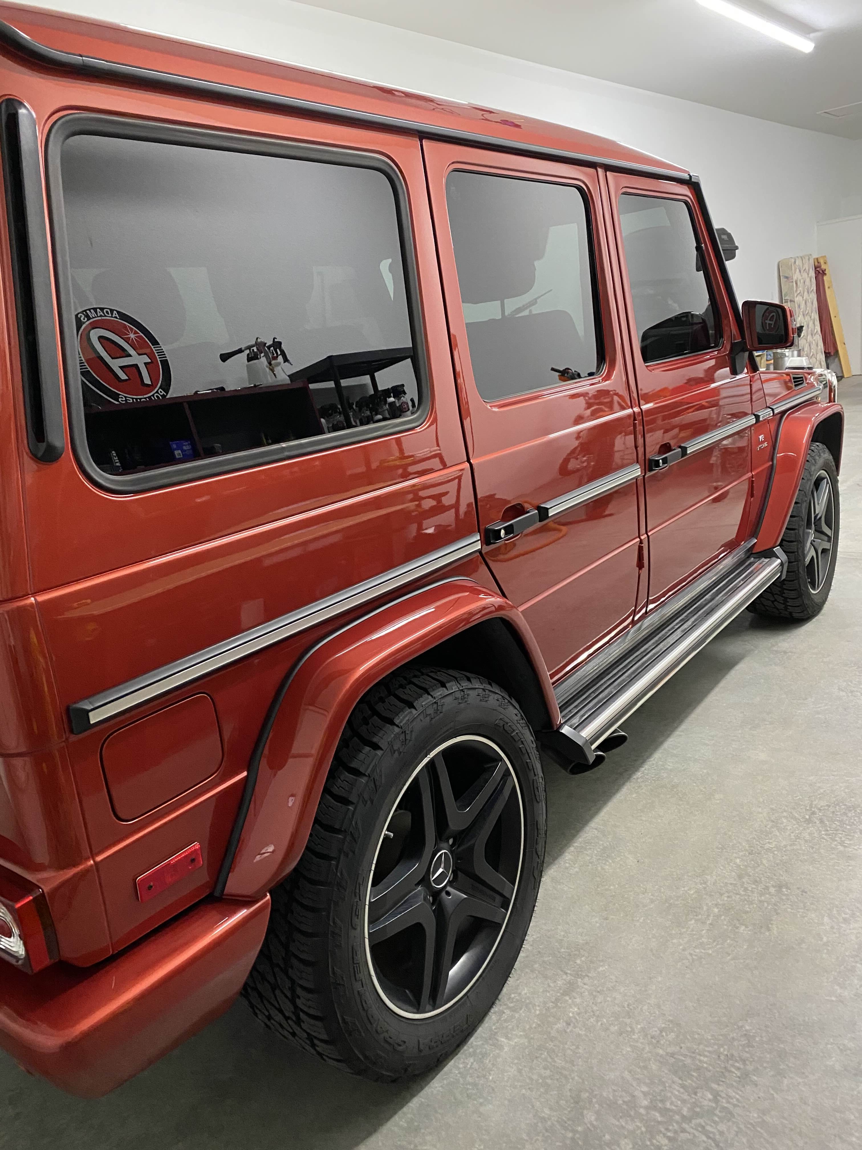Red Mercedes-AMG G-Wagon in detailing bay